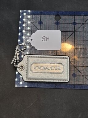 Coach Silver Metallic Leather Tag Keychain